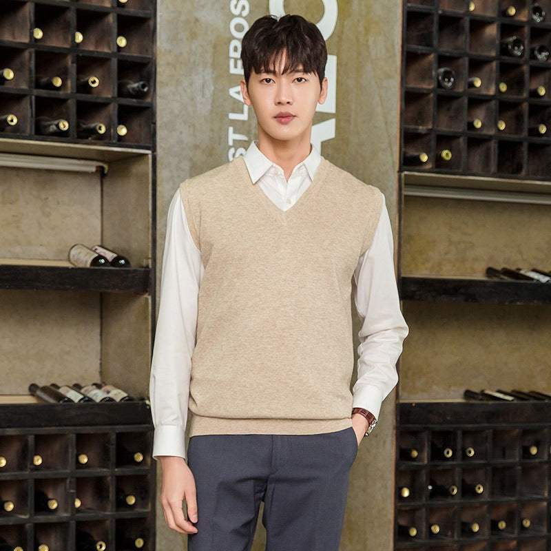 Mens vest pullover knitted sleeveless sweater in beige, styled over white shirt for autumn and winter casual wear.