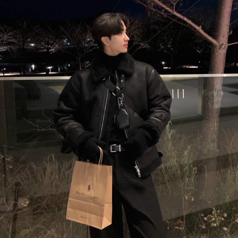 Man wearing men's winter loose and warm stand collar cotton-padded coat holding a shopping bag outdoors at night