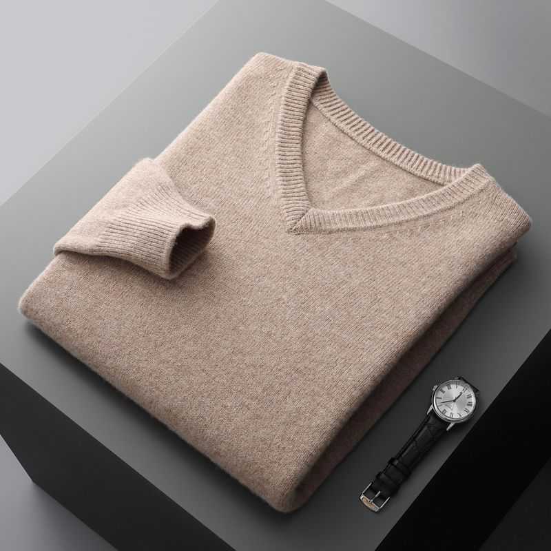 Folded beige V-neck undershirt for men made of soft, breathable fabric, paired with a black leather strap wristwatch, styled for business casual light luxury.