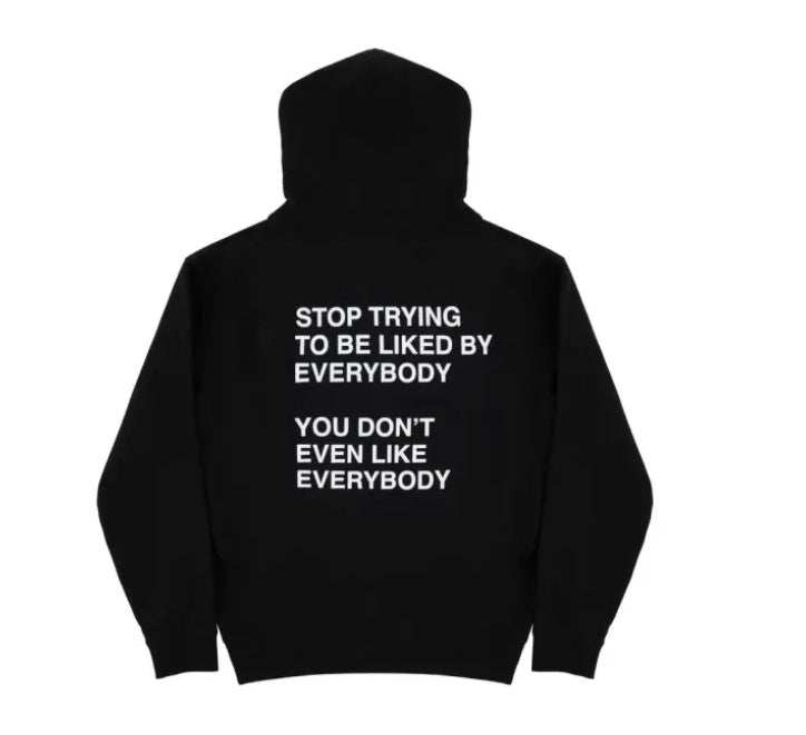 Black men's and women's sweatshirt with white slogan "Stop trying to be liked by everybody, you don't even like everybody" and drawstring hood.