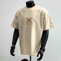 Beige cotton loose heavy short sleeve T-shirt with "History" text and crossed lines design on front