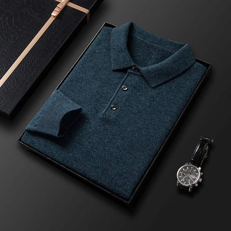 Thickening men's pure wool long sleeve knitted sweater in dark blue with collar and buttons, neatly folded in a black gift box next to a black wristwatch.