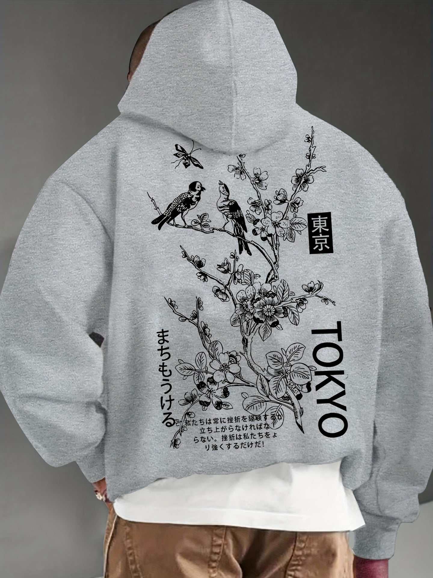 Fashion Personality men's casual hoodie in grey with black Tokyo floral and bird design on the back.
