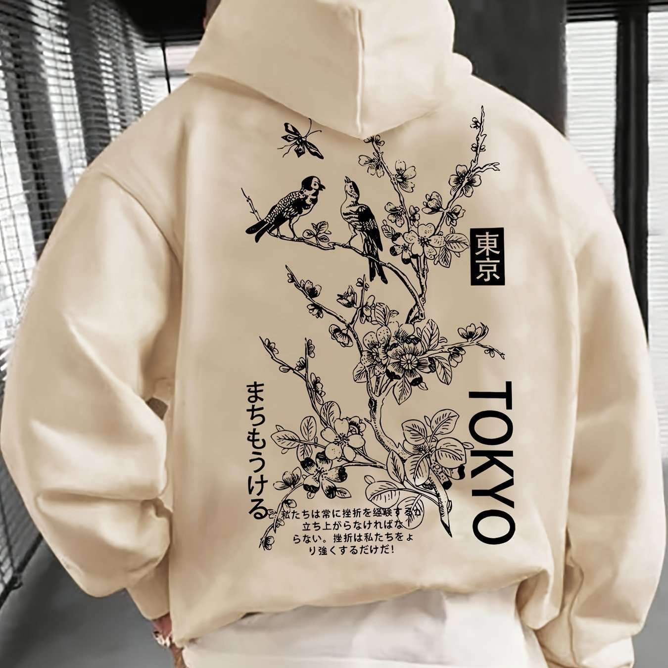 Apricot men's casual hoodie with black Tokyo floral and bird graphic, loose fit polyester fabric