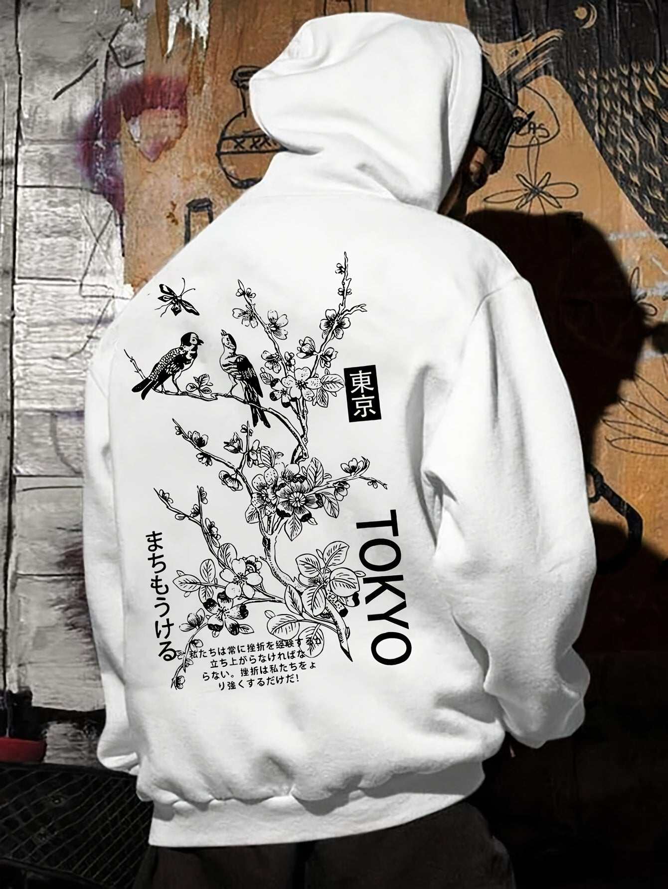 White men's casual hoodie with black Tokyo floral and bird graphic design on back, loose fit, polyester fabric.