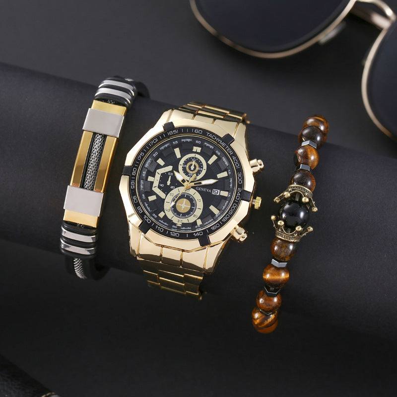 Gold-tone quartz watch with black dial and metal bracelet alongside two stylish bracelets and sunglasses on dark background